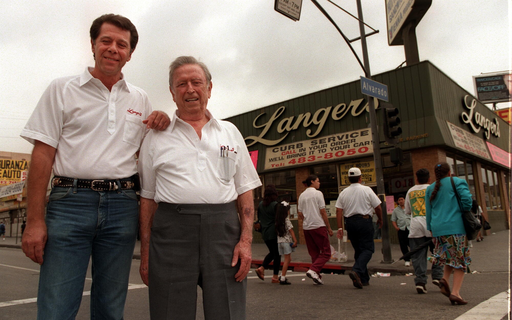 Norm Langer, left, with his father, Al Langer in front of Langers Deli on Alvarado St in Los Angeles, June 12, 1997.
