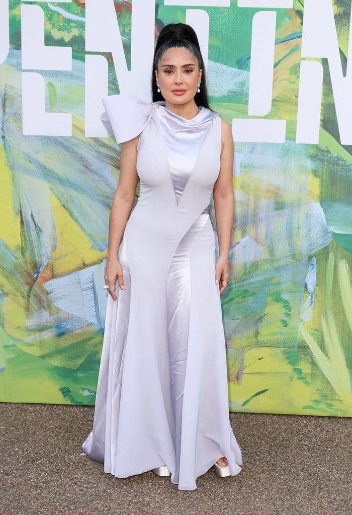 photo of salma hayek in blue dress and hair in high ponytail