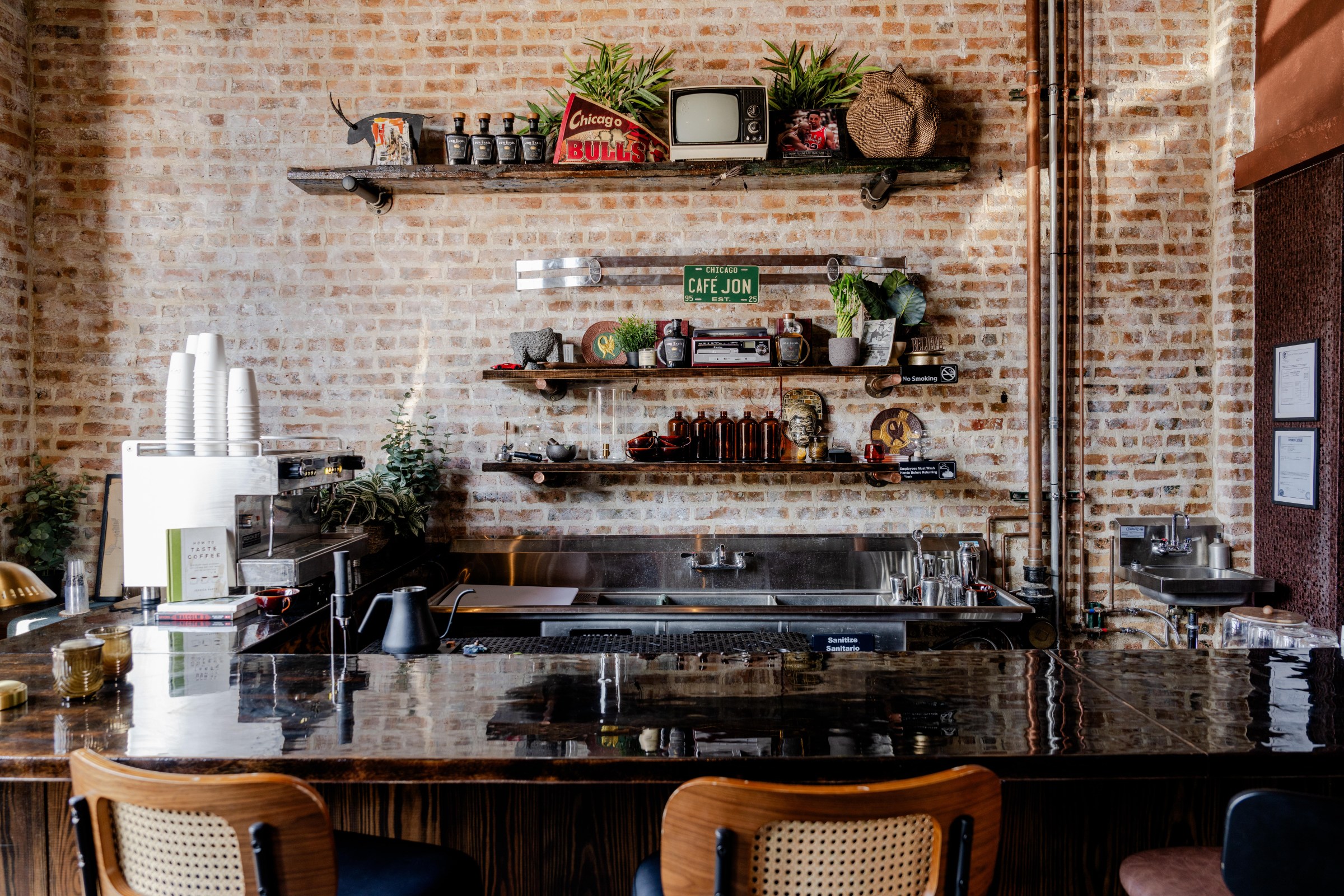Momentos and memorabilia line the shelves at Cafe Jon’s cafe bar.