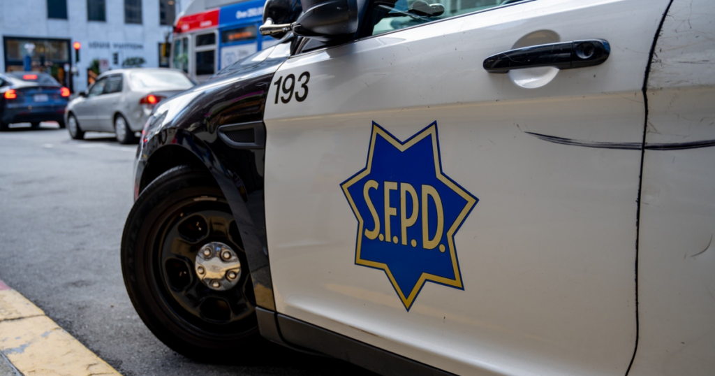 Dog attack in Tenderloin leaves woman with life-threatening injuries A white and black San Francisco Police Department car parked on a street with the S.F.P.D. emblem and number 193 on the door.
