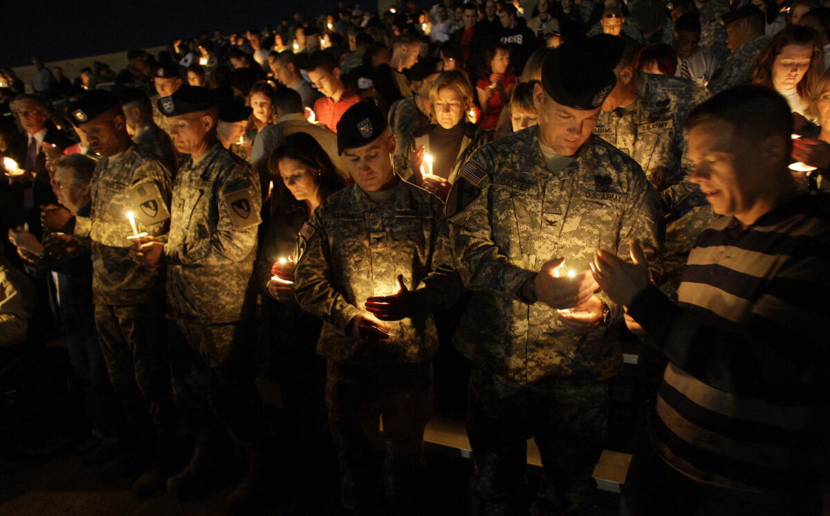 Soldiers hold a candlelight vigil at Ft. Hood, Texas, in 2009.
