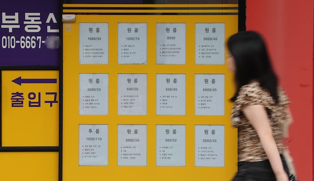 Monthly rents for one-room apartments are posted at a real estate agency in front of Sungkyunkwan University in Seoul. /Courtesy of Yonhap News