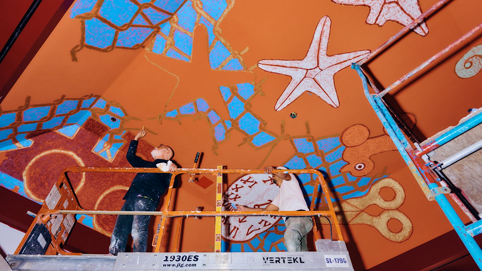 Francesco Clemente painting the ceiling of Humm in New York City.